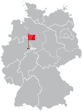 Graue Karte von Deutschland mit einer roten Markierung an einer zentralen Stelle.